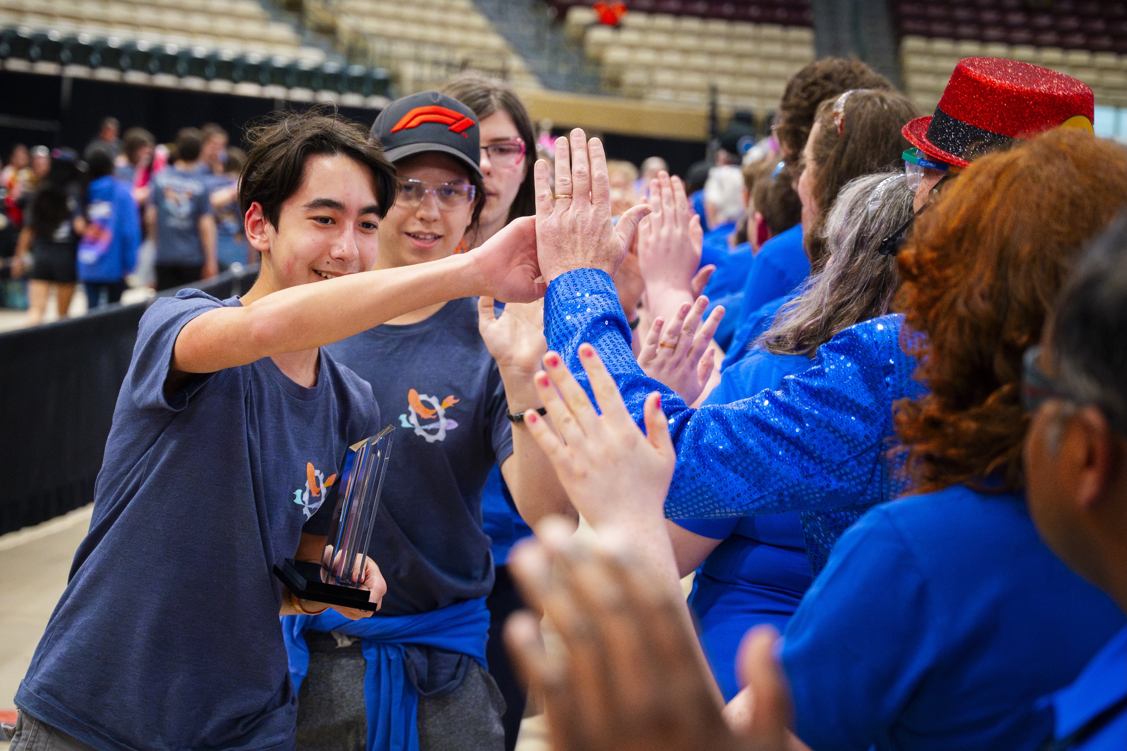 High fiving people